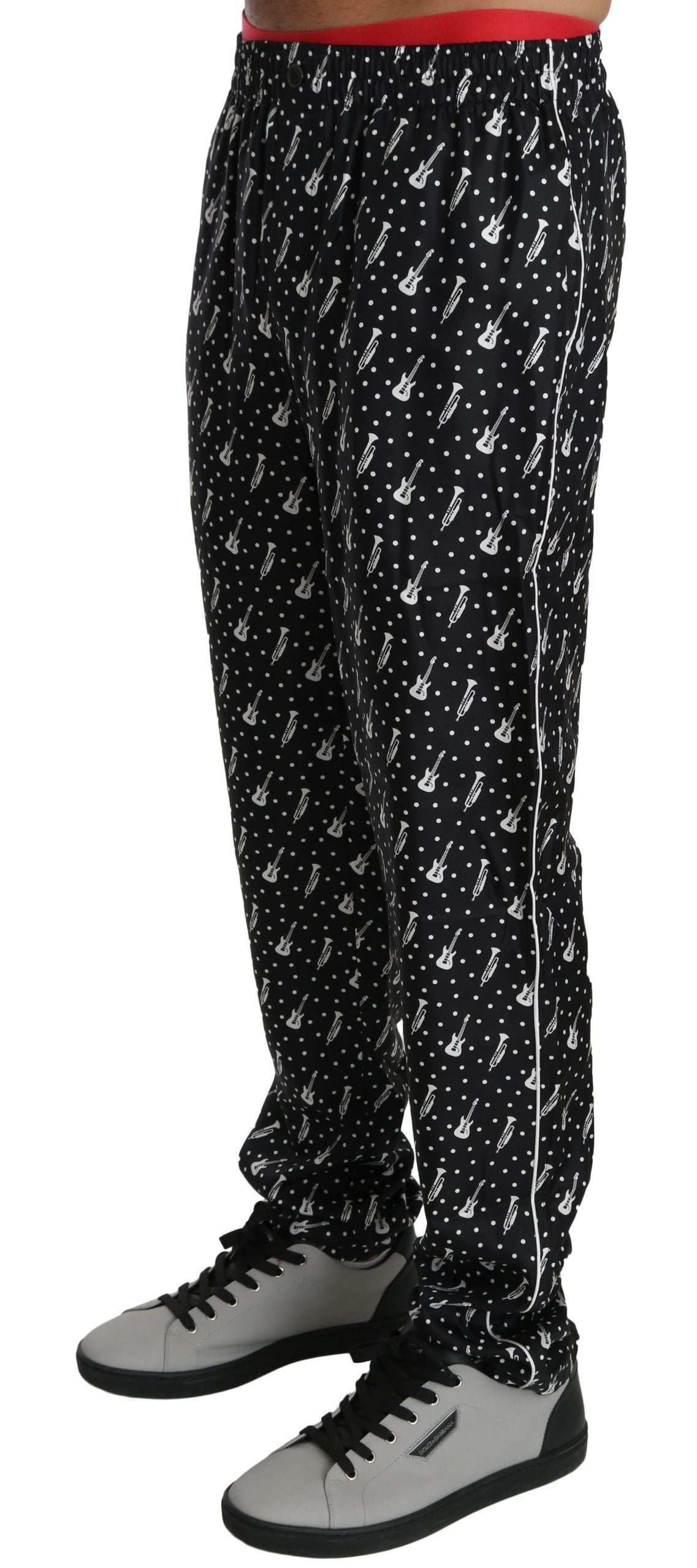 Dolce &amp; Gabbana Elegant black silk trousers with musical instrument print