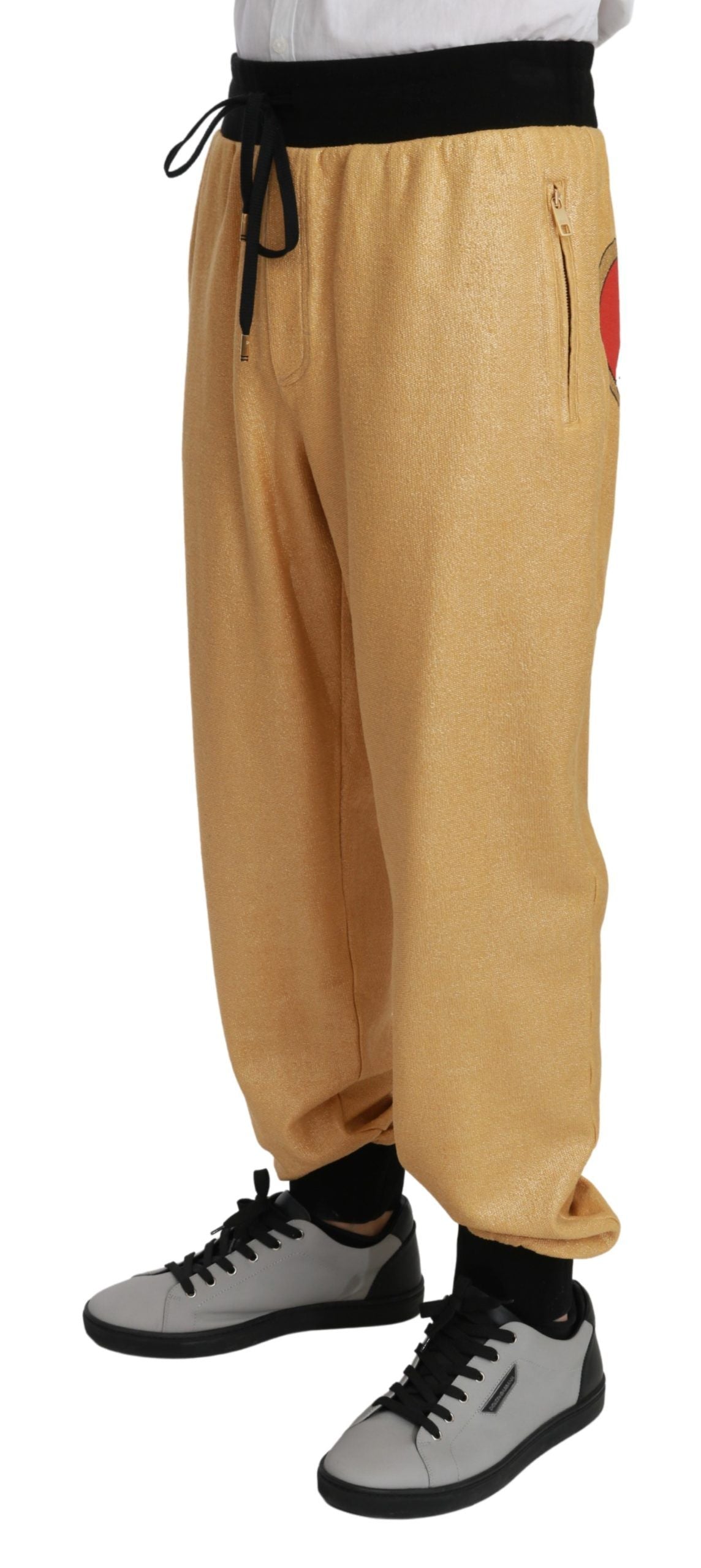 Dolce &amp; Gabbana Elegant gold motif sweatpants