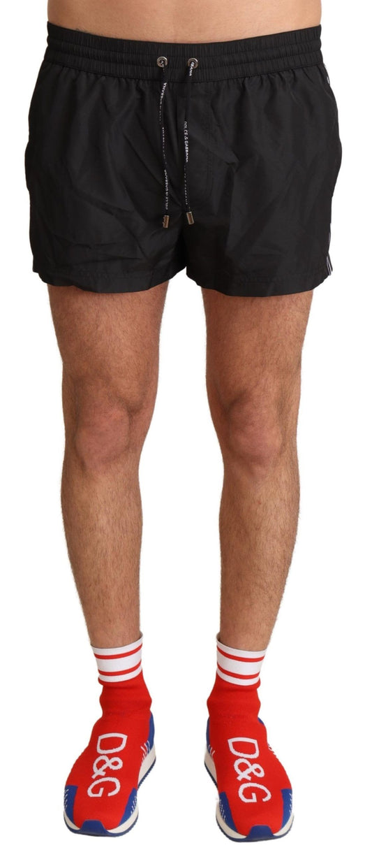 Dolce &amp; Gabbana Elegant black KING motif swim shorts