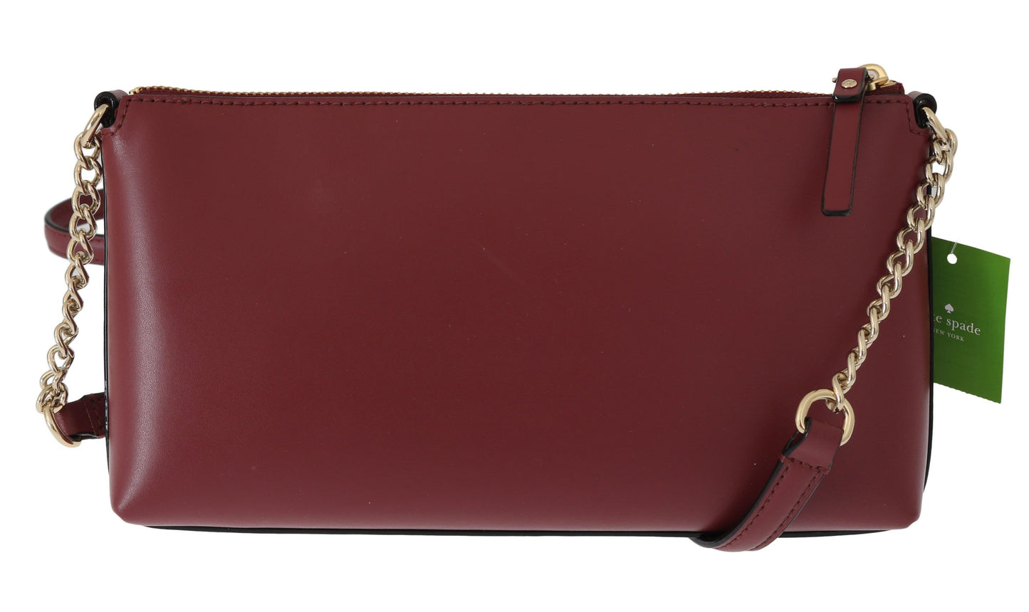 Kate Spade Elegant burgundy leather crossbody bag