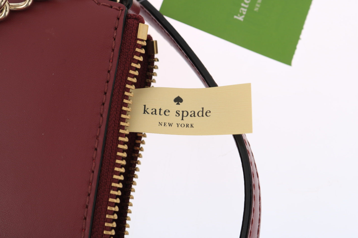 Kate Spade Elegant burgundy leather crossbody bag