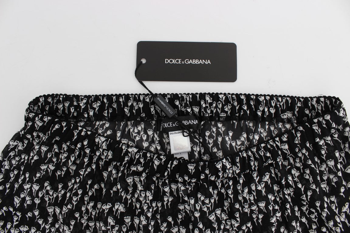 Dolce & Gabbana Elegante schwarz-weiße Shorts aus geblümter Seidenspitze