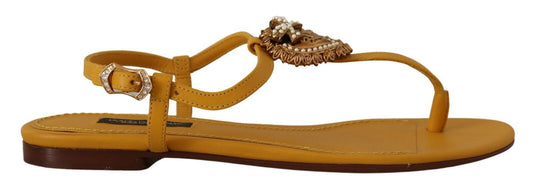 Dolce &amp; Gabbana mustard yellow flat sandals with T-strap and heart embellishment