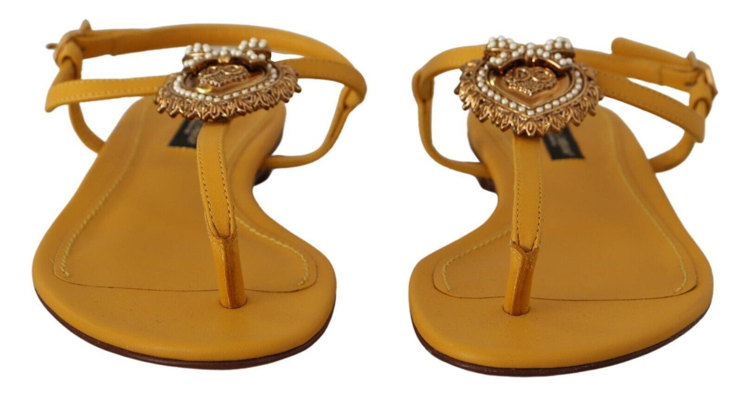 Dolce &amp; Gabbana mustard yellow flat sandals with T-strap and heart embellishment