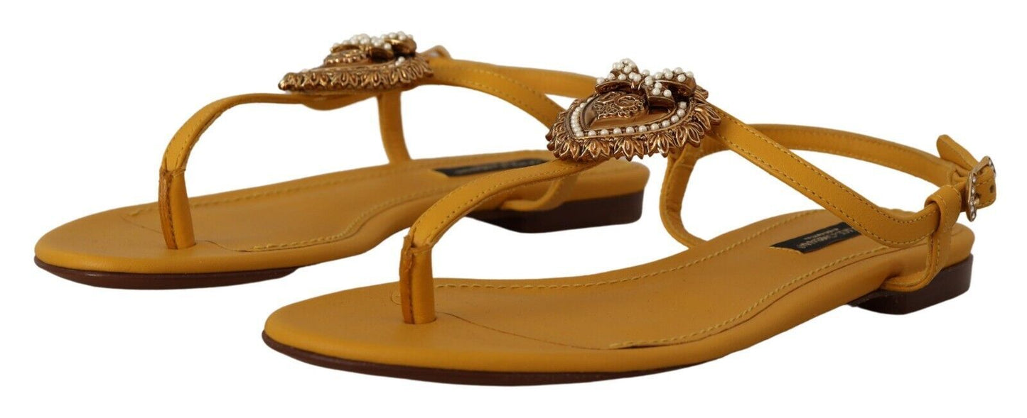 Dolce &amp; Gabbana mustard yellow flat sandals with T-strap and heart embellishment