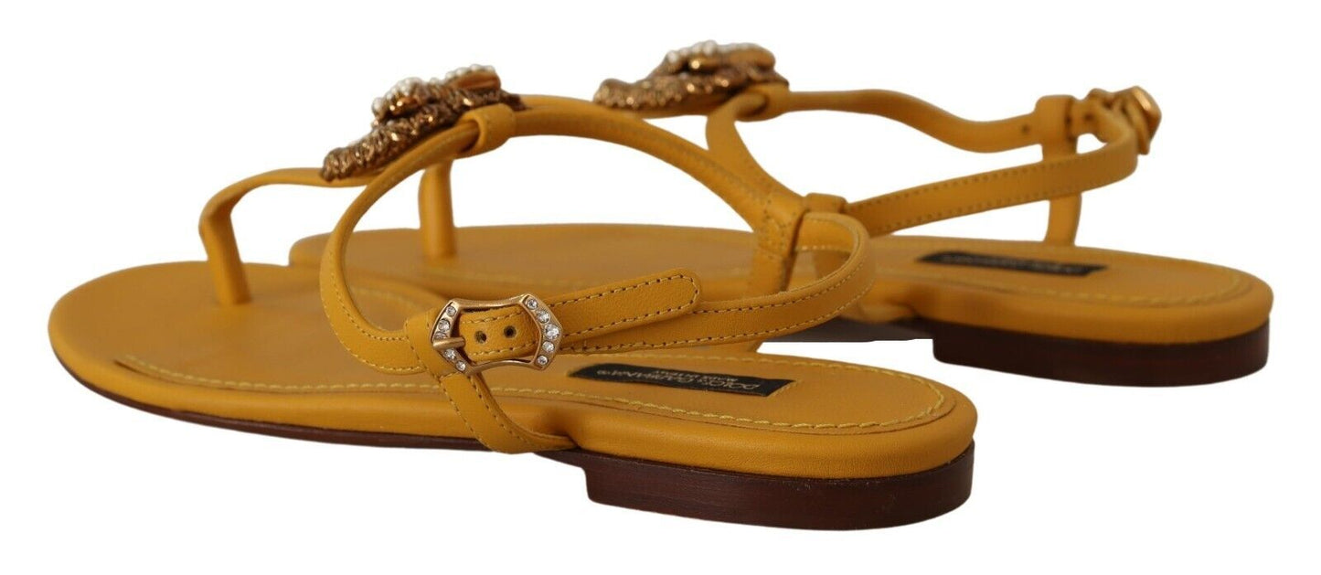 Dolce &amp; Gabbana mustard yellow flat sandals with T-strap and heart embellishment