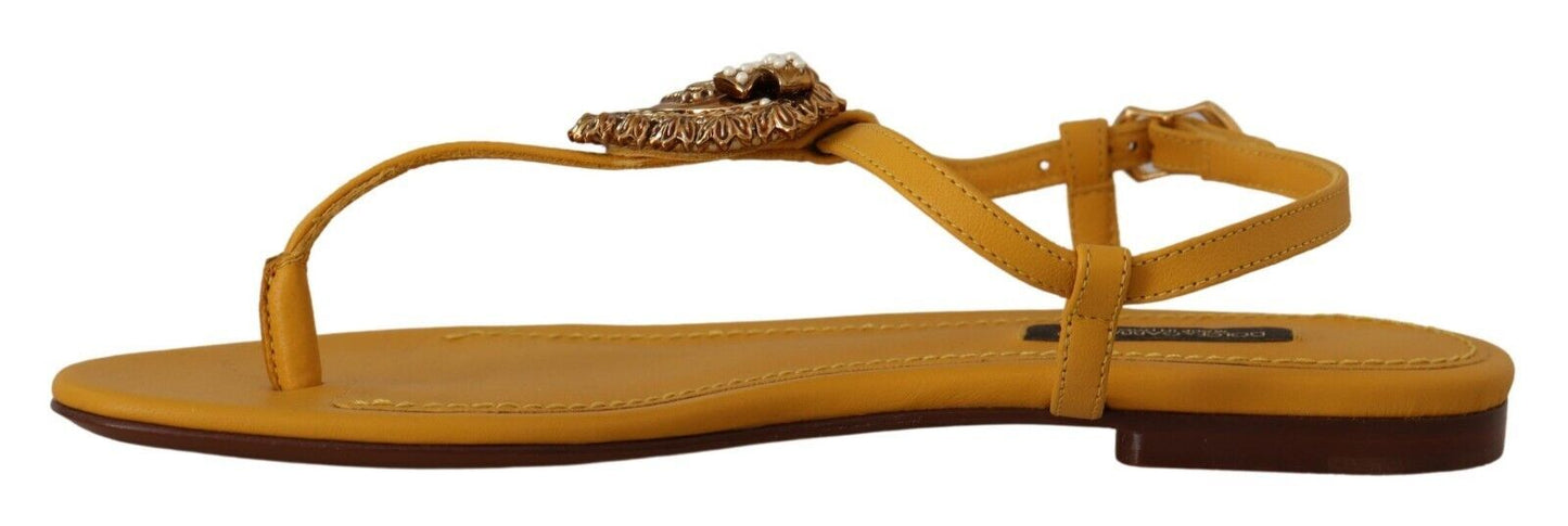 Dolce &amp; Gabbana mustard yellow flat sandals with T-strap and heart embellishment