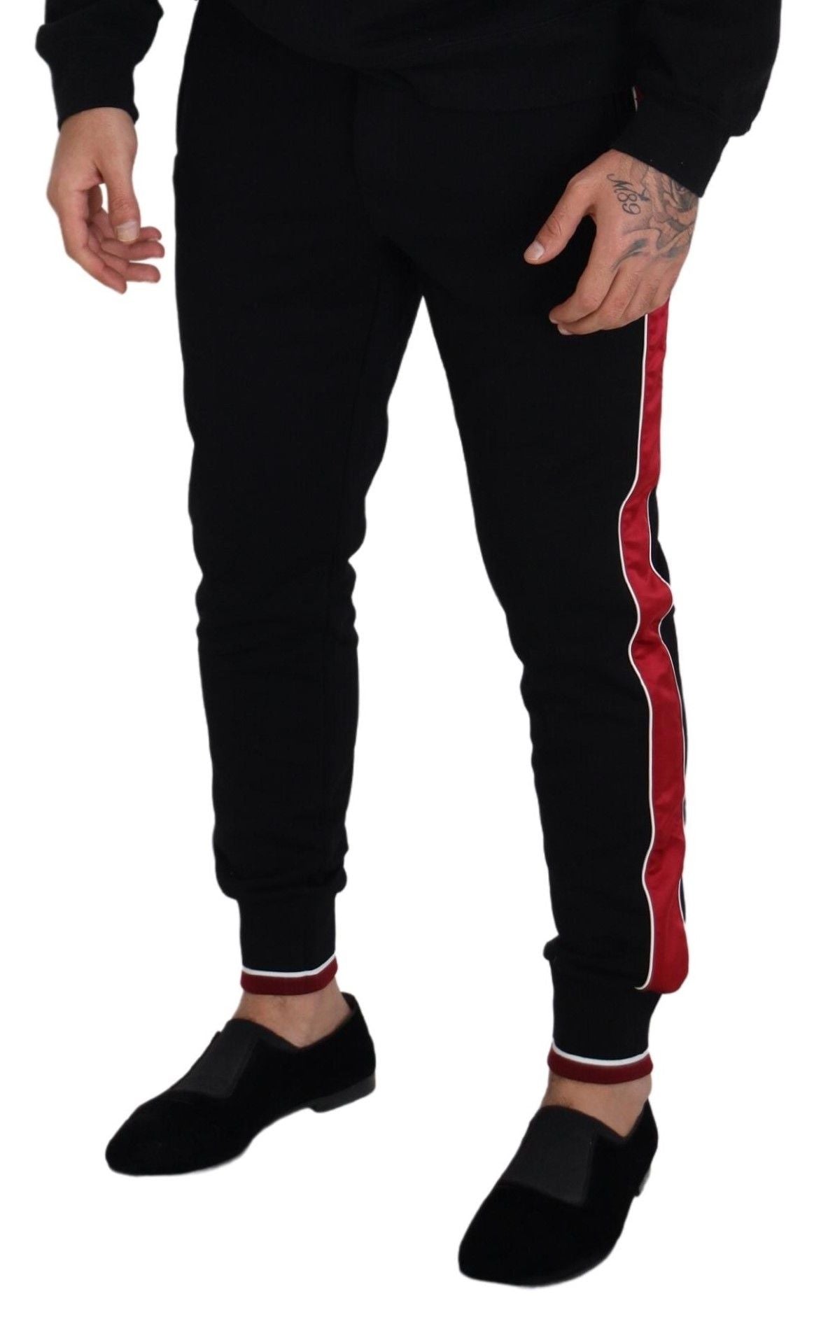 Dolce &amp; Gabbana Elegant black jogging pants with red detail