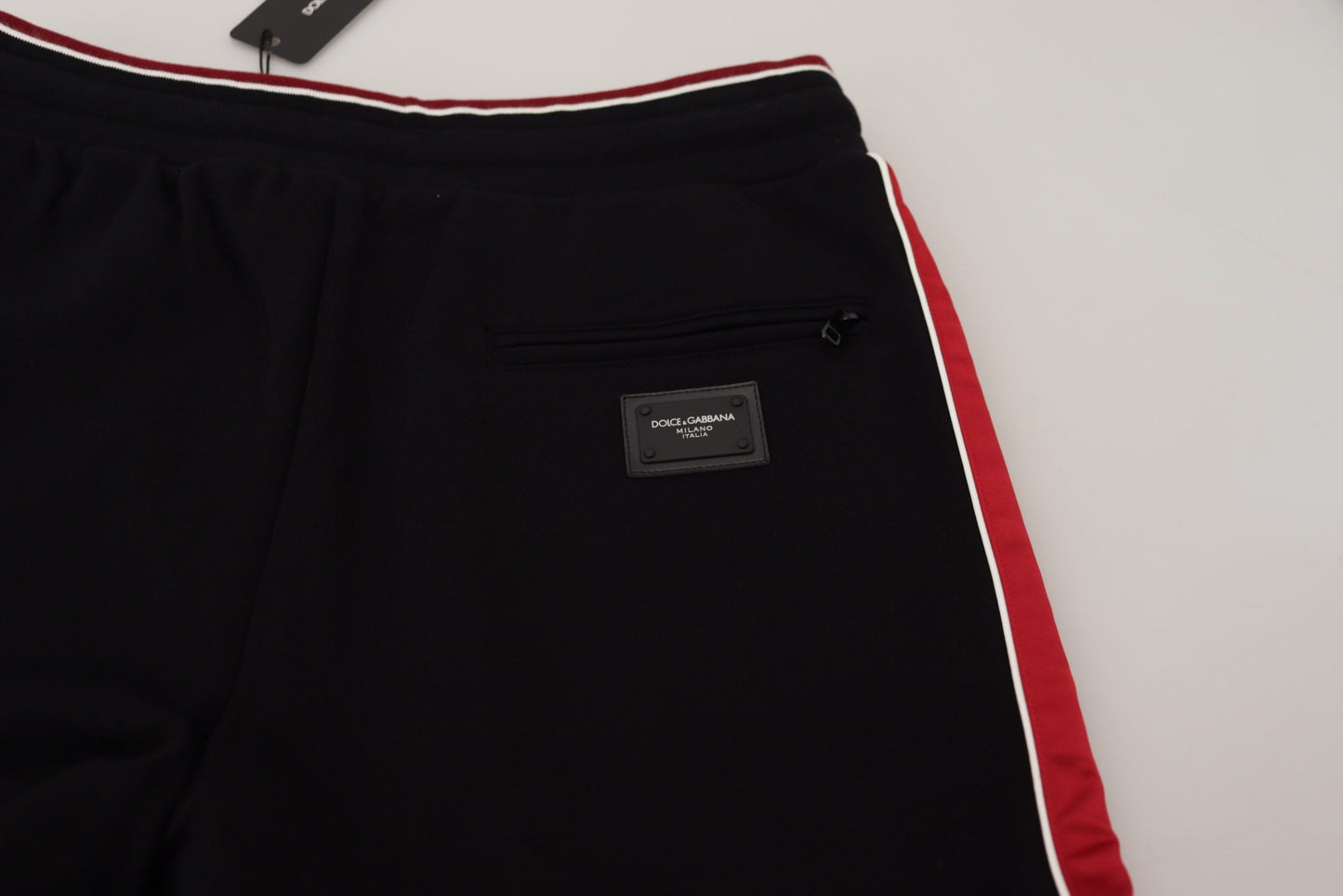 Dolce &amp; Gabbana Elegant black jogging pants with red detail