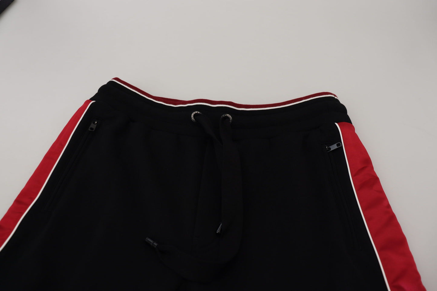 Dolce &amp; Gabbana Elegant black jogging pants with red detail