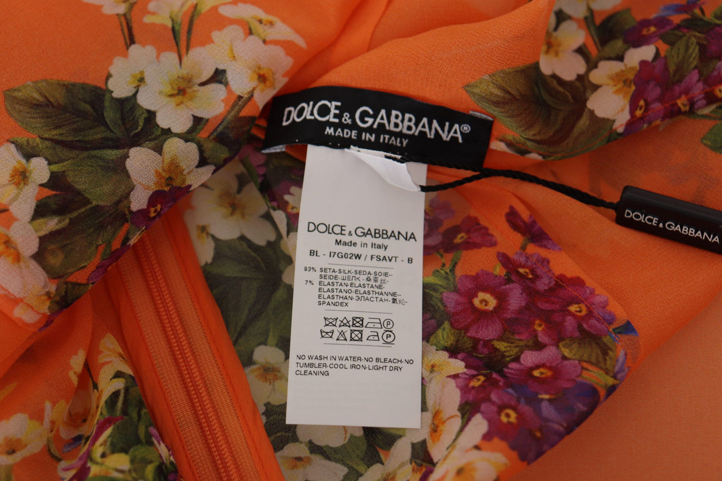 Dolce &amp; Gabbana Elegant floral silk blouse with back zip