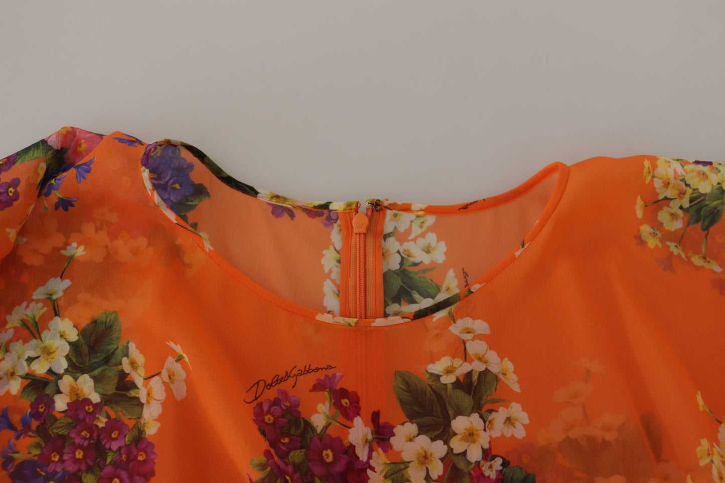 Dolce &amp; Gabbana Elegant floral silk blouse with back zip