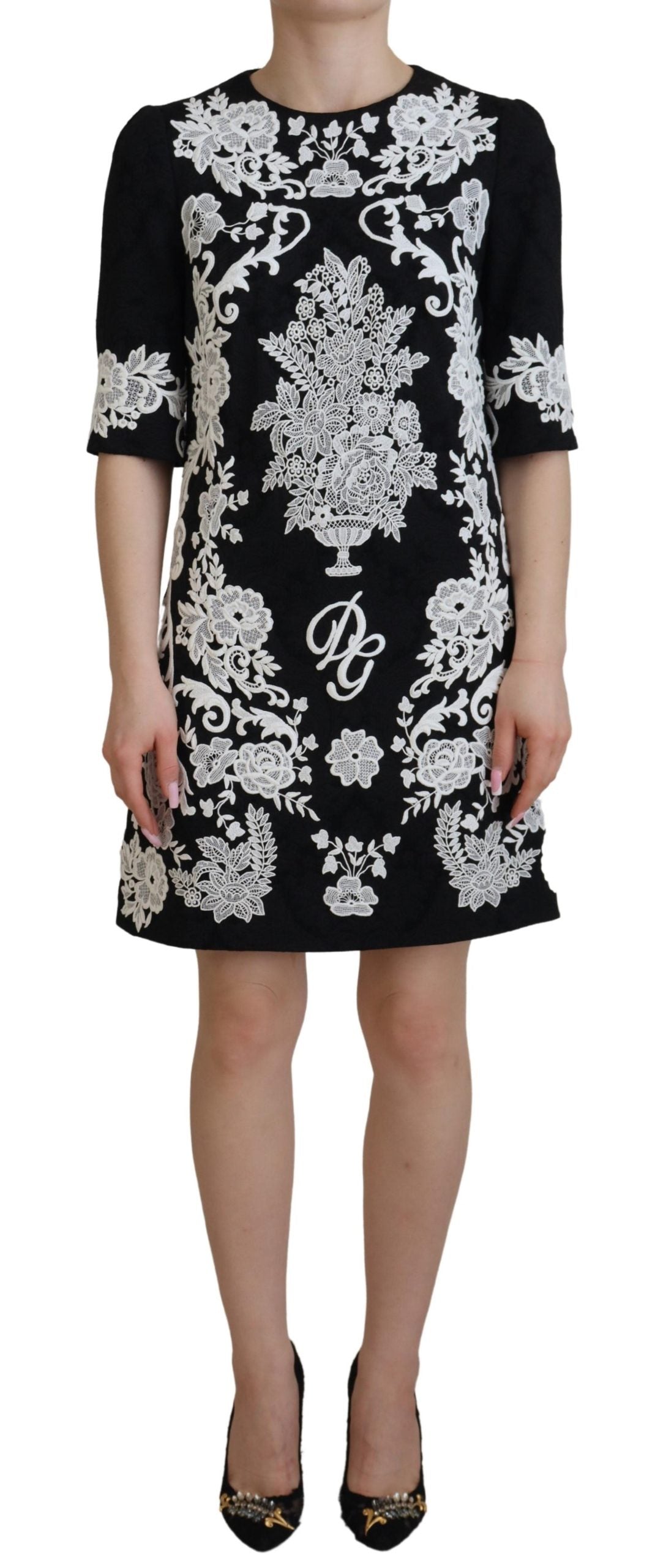 Dolce & Gabbana Elegantes Schwarzes A-Linien-Minikleid mit Spitzenbesatz