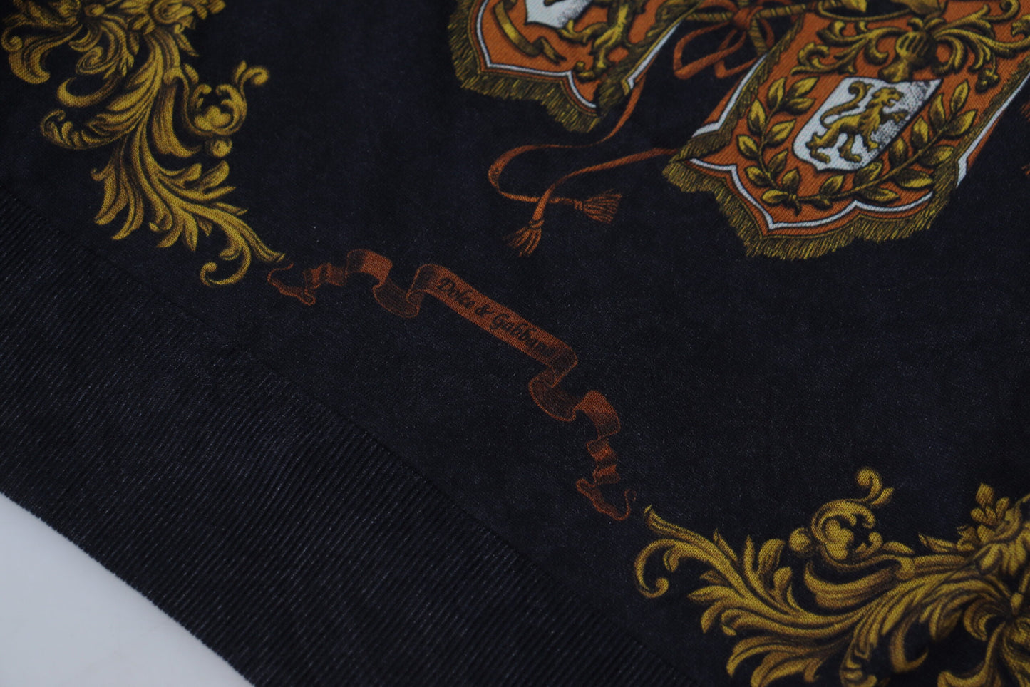 Dolce &amp; Gabbana silk sweater with baroque medal motifs