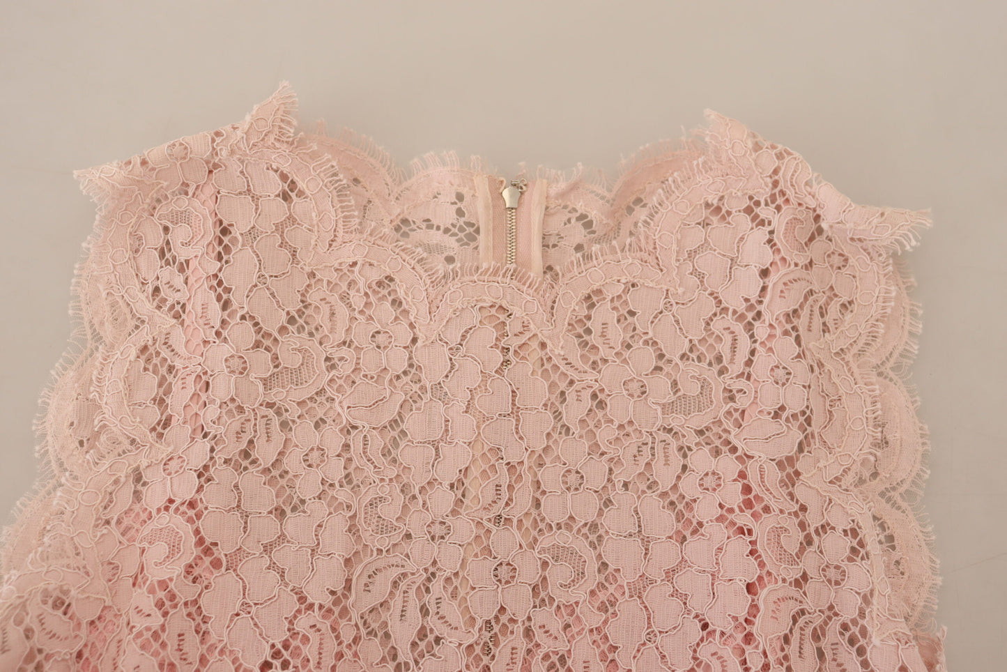 Dolce &amp; Gabbana Elegant sleeveless blouse made of transparent lace in pink