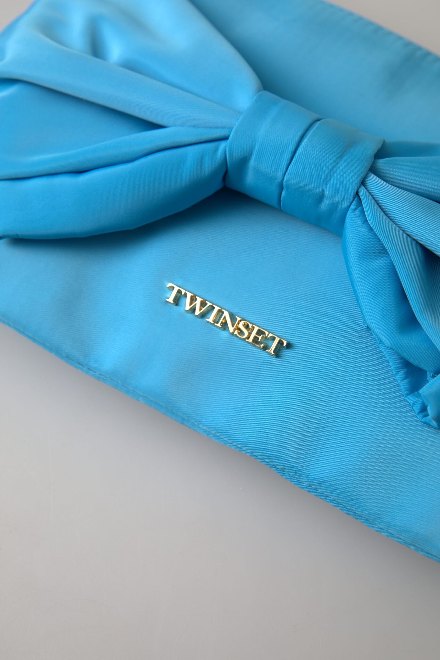 Twinset Elegant silk clutch with bow decoration