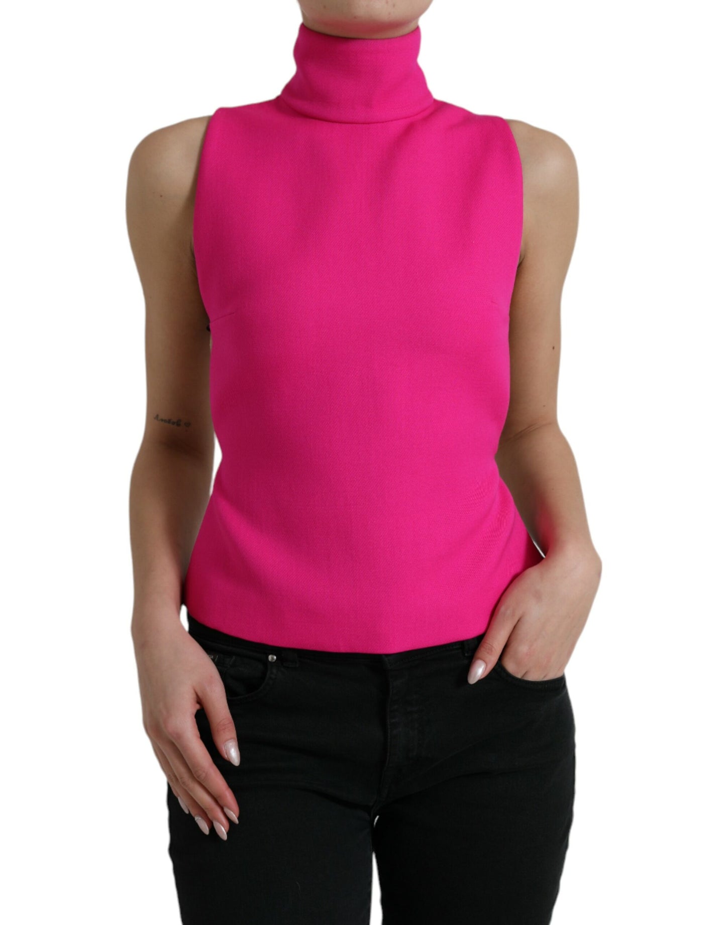 Dolce &amp; Gabbana Elegant sleeveless wool top with turtleneck in pink