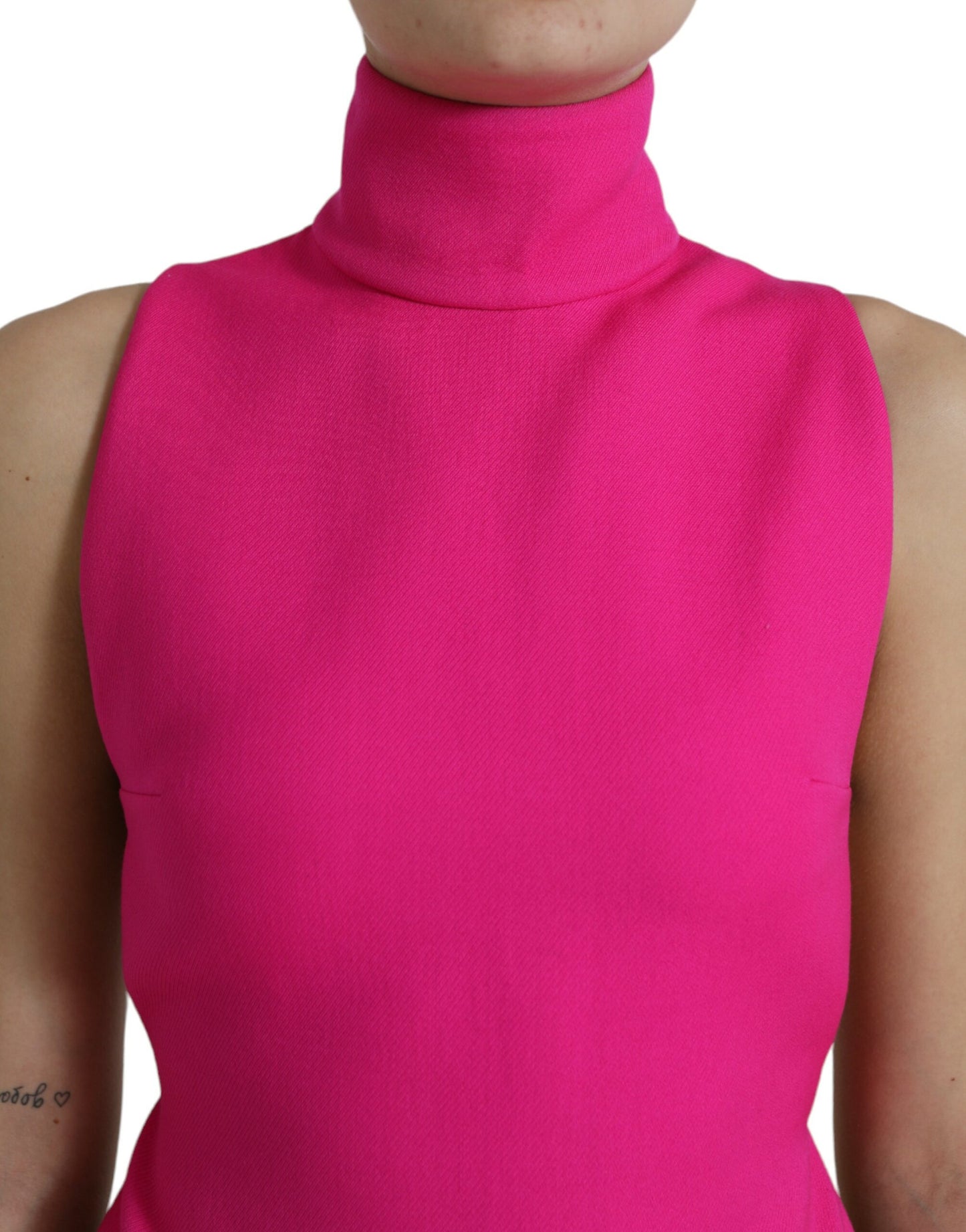 Dolce &amp; Gabbana Elegant sleeveless wool top with turtleneck in pink