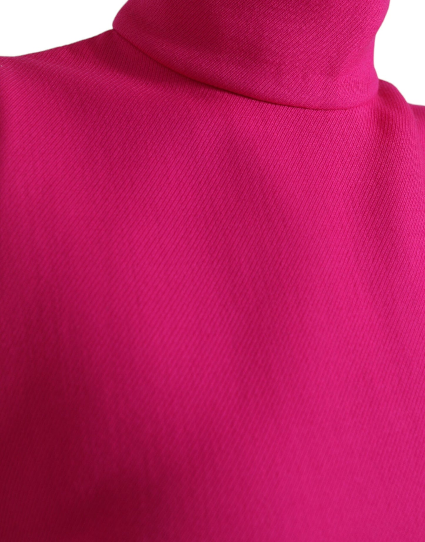 Dolce &amp; Gabbana Elegant sleeveless wool top with turtleneck in pink