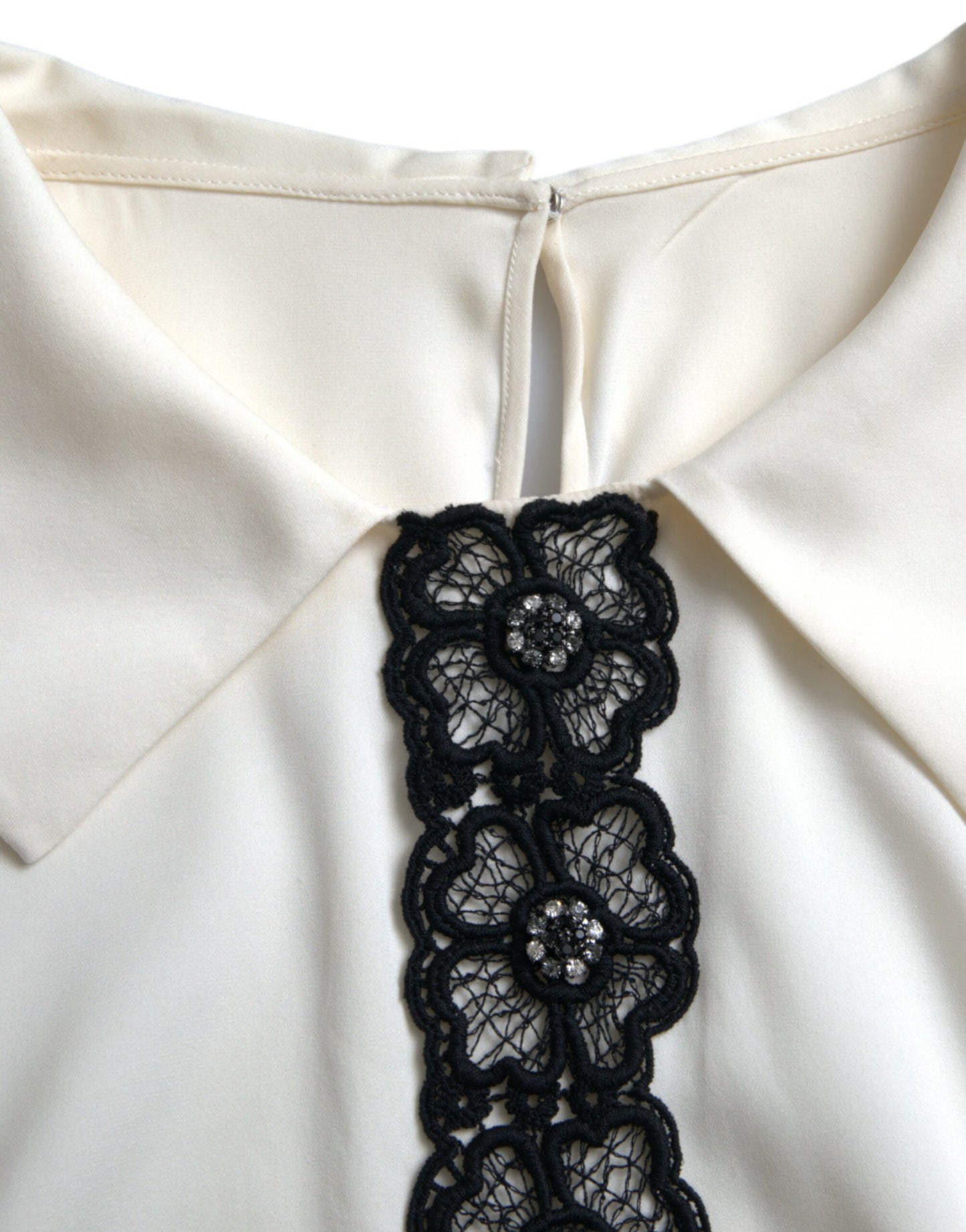 Dolce &amp; Gabbana Elegant off-white silk blouse with lace trim