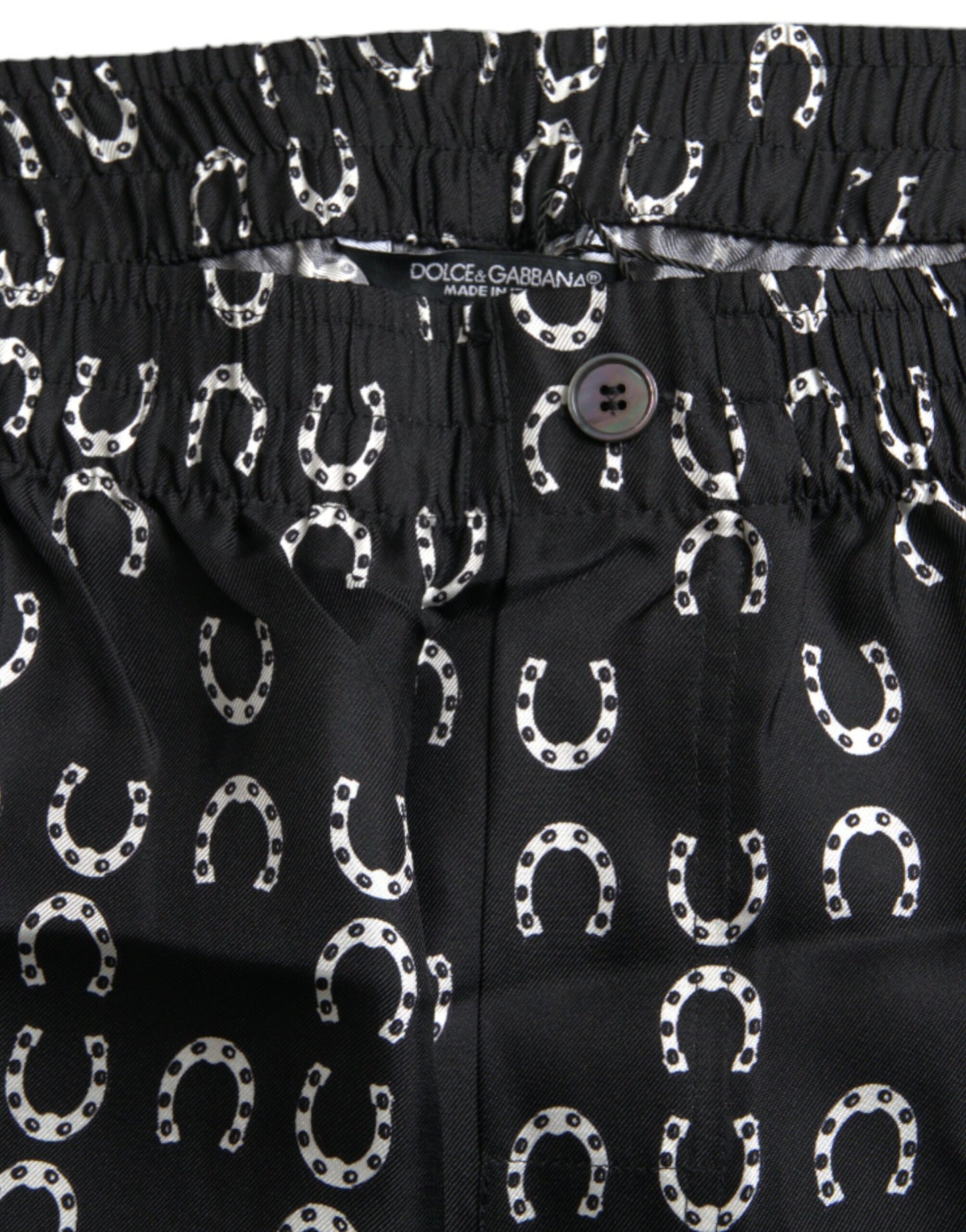 Dolce &amp; Gabbana Black silk trousers with horseshoe pattern