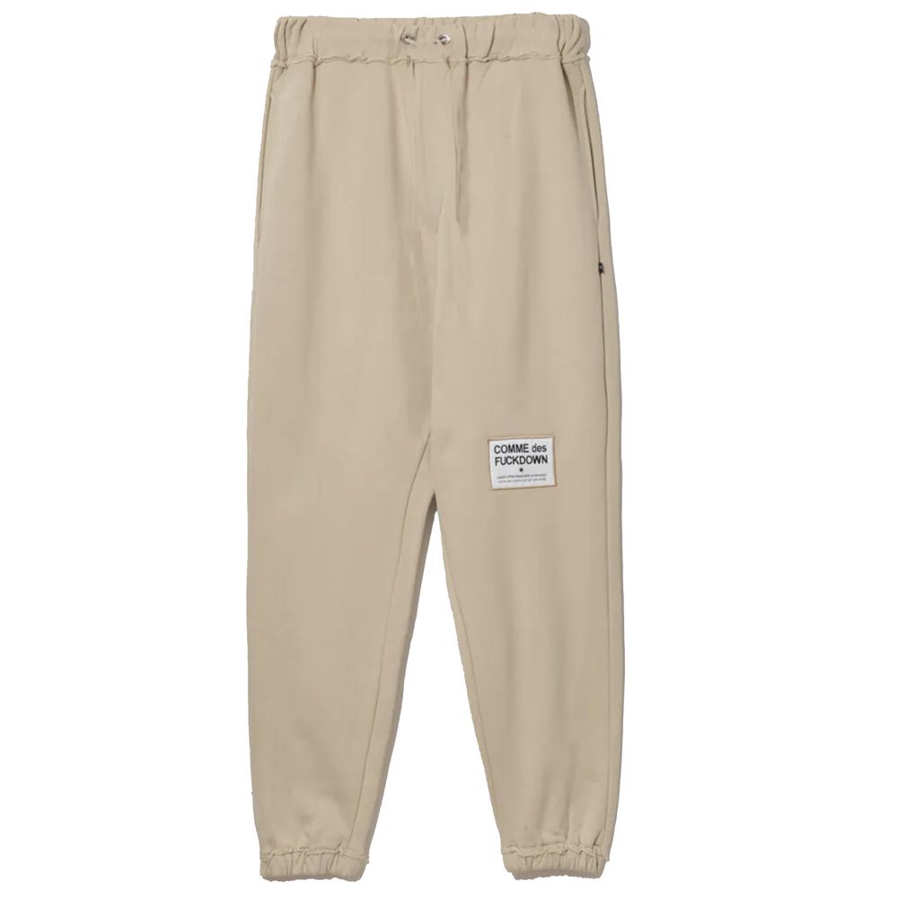 Comme Des Fuckdown beige cotton sweatpants with frayed details