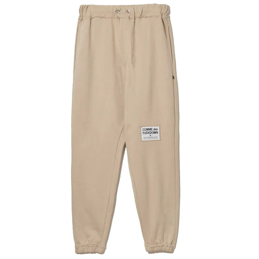 Comme Des Fuckdown beige cotton sweatpants with frayed details