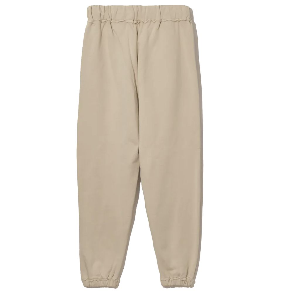 Comme Des Fuckdown beige cotton sweatpants with frayed details