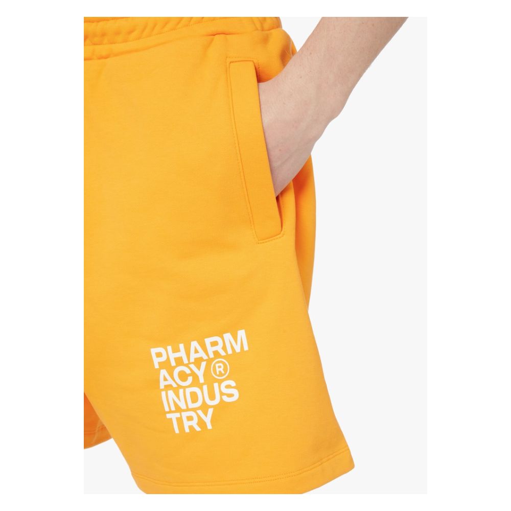 Pharmacy Industry Chic orange cotton pants with logo print