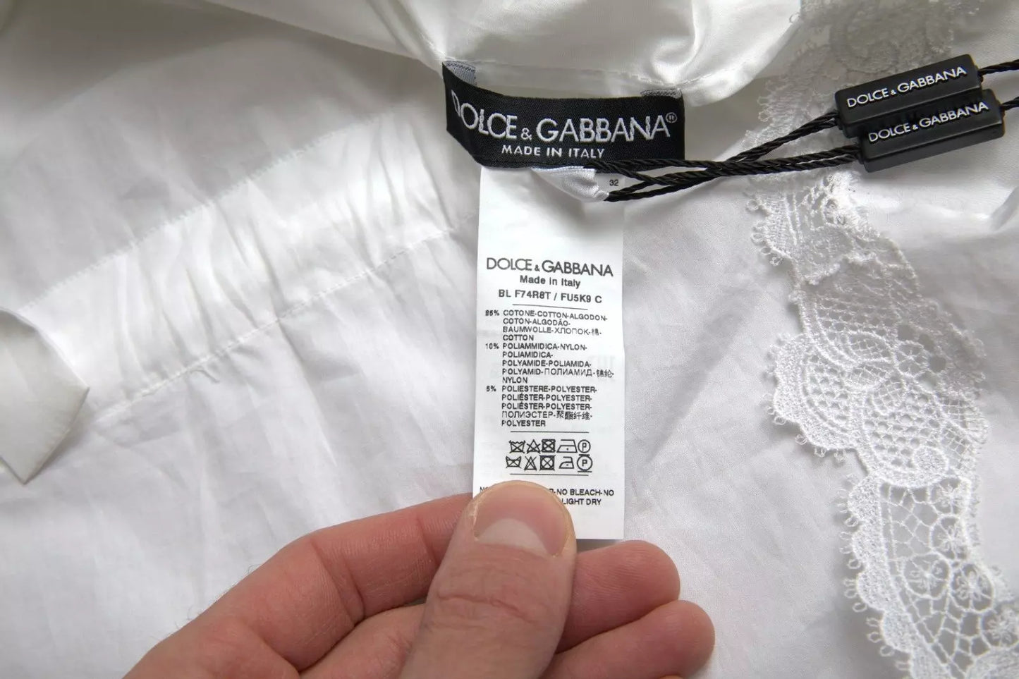 Dolce &amp; Gabbana White cotton turtleneck blouse with lace trim (copy)