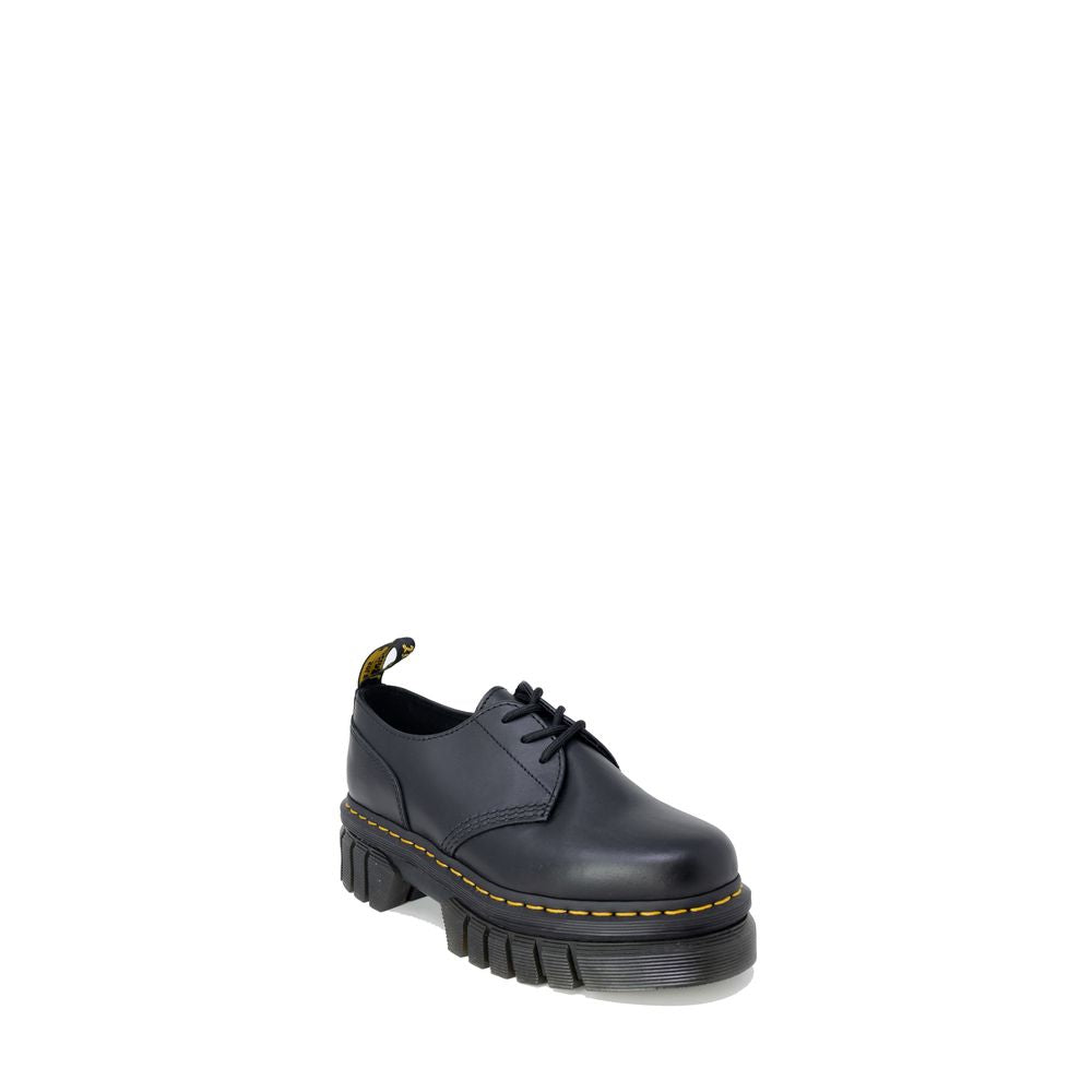 Dr. Martens Flacher Schuh aus schwarzem Leder