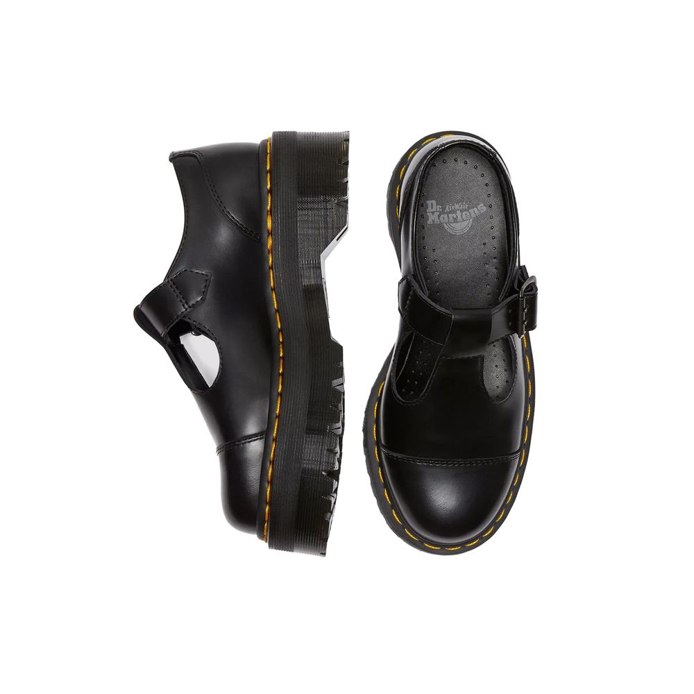 Dr. Martens Flacher Schuh aus schwarzem Leder