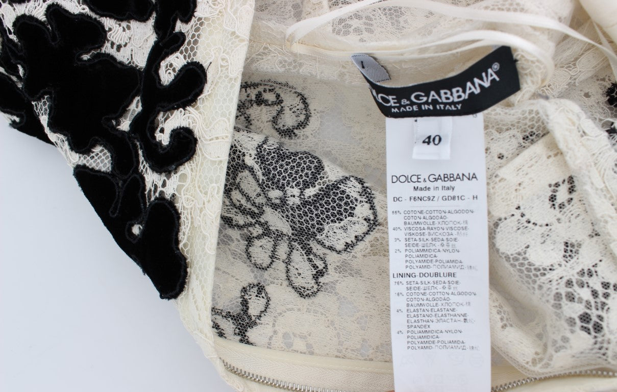 Dolce & Gabbana Elegantes Maxikleid mit floraler Spitze und langen Ärmeln